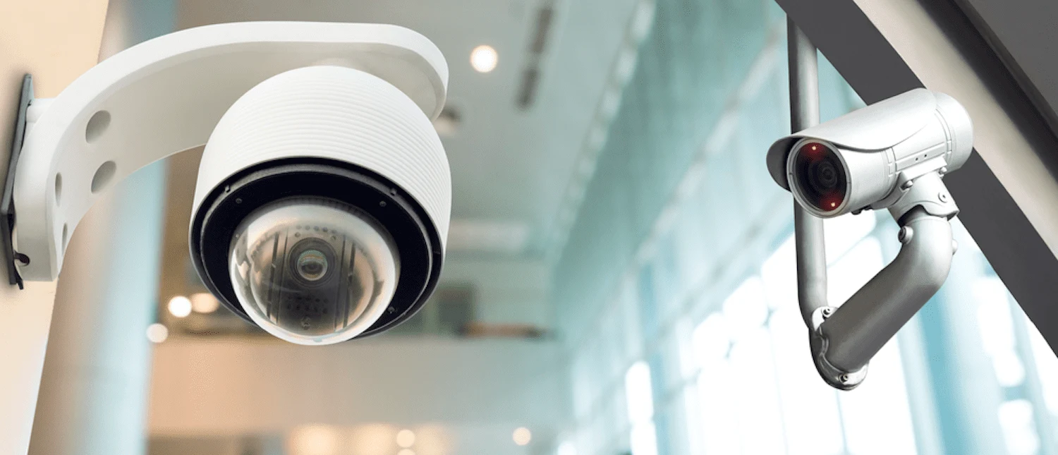 Two security cameras in a building