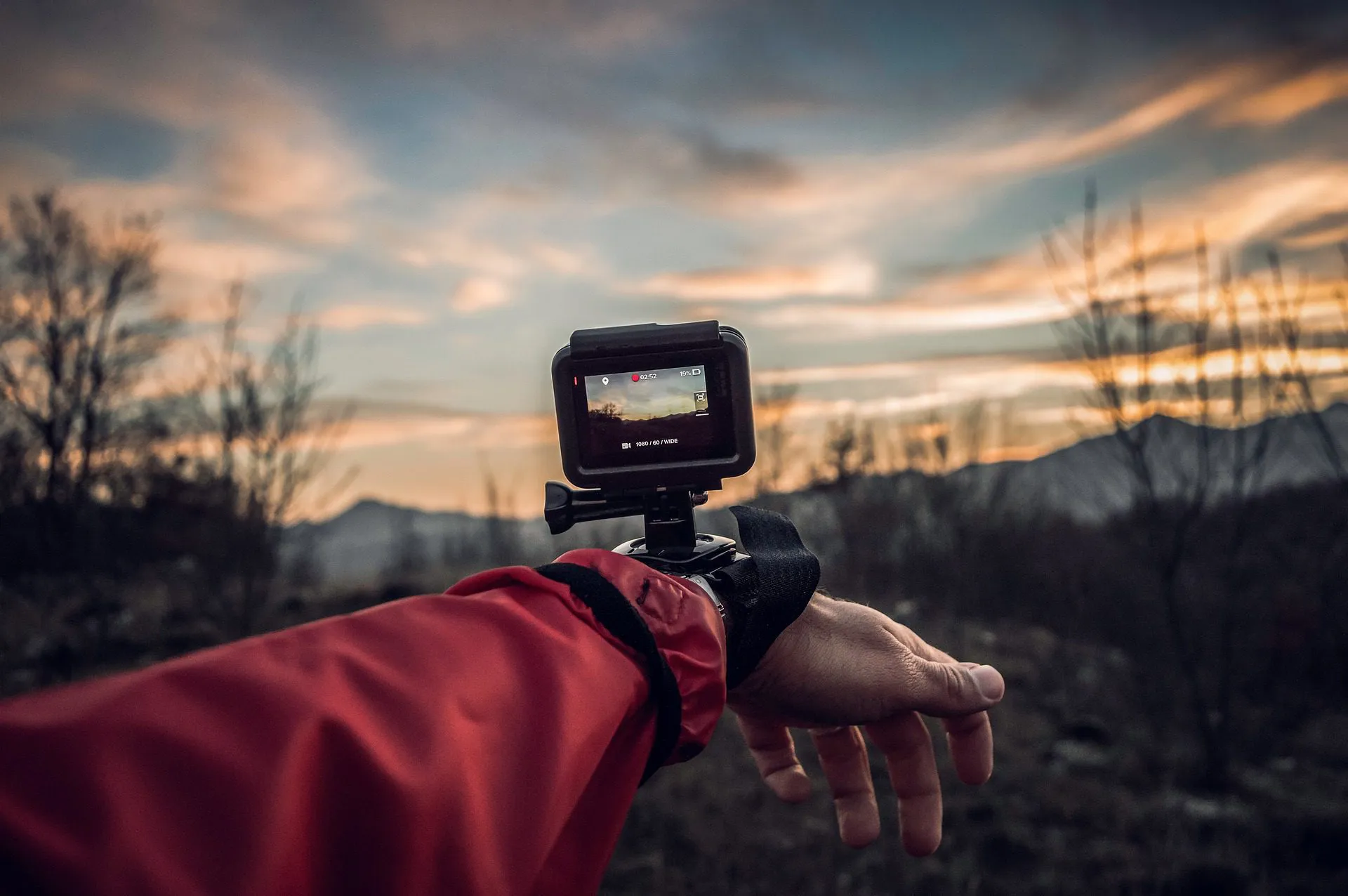 GoPro on a wrist mount at sunset.
